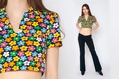 90s floral crop top! The fit: Designed to be fitted throughout The details: V neck  Pointed collar Short sleeves Floral print Stretchy fabric Short cropped lenght Color: Black, blue, yellow, green, orange, white, pink Type: Crop top Material: Spandex Best fits: Small - Medium (EU sizing) (check measurements for exact sizing) Circa: 1990s, 2000s Label: Avant, Made in Italy Condition: excellent vintage! MEASUREMENTS Taken from seam to seam while the garment is lying flat and are then doubled.  arm 90s Style Short Sleeve Crop Top For Summer, Y2k Floral Print Top For Spring, Spring 90s Inspired Short Sleeve Crop Top, 90s Inspired Short Sleeve Crop Top For Spring, Retro Fitted Short Sleeve Crop Top, Fitted Short Sleeve Top With Vintage Print, Fitted Vintage Print Top With Short Sleeves, Spring Retro Print Short Sleeve Tops, 90s Floral Print Summer Tops