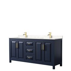 a double sink vanity with two gold faucets on the top and white counter tops