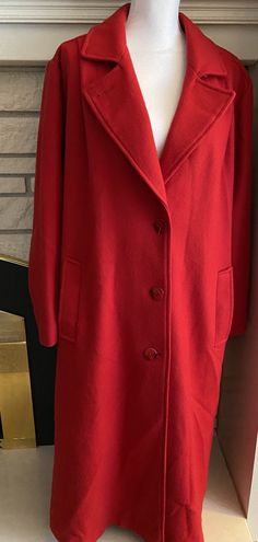 Made with Andover fabric by Forstmann .In excellent condition. See photos for measurements but i think it is aprox a size 20/22 or XXL Belted in the back and buttoned front. Made in USA Formal Red Wool Coat, Fitted Long Wool Sweater Coat, Red Long Outerwear With Buttons, Long Red Outerwear With Buttons, Classic Red Long Wool Coat, Fitted Red Wool Long Coat, Classic Red Wool Coat, Red Long Wool Coat With Buttons, Red Wool Single-breasted Outerwear