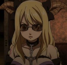 an anime character with long blonde hair wearing glasses and horns on her head, looking at the camera