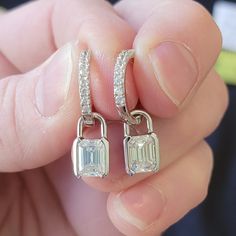 Brand New, 1 Carat Each, Emerald Cut, Moissanite Huggie Earrings. The Locks Are Removable, Leaving A Classic, Beautiful Pave Huggie. Moissanite Is Man Made Diamond And Will Test Positive On A Diamond Tester. High-Quality 18k White Gold Plating Over S925, Waterproof, Rustproof. Will Last Forever. Great For Sensitive Ears 23 Sterling Silver Earrings With Baguette Cut And Prong Setting, Sterling Silver Emerald Cut Earrings With Diamond Accents, Silver Moissanite Baguette Cut Earrings, Silver Emerald Cut Moissanite Earrings, White Gold Emerald Cut Moissanite Earrings, Gia Certified Baguette Cut Sterling Silver Earrings, Emerald Cut White Sterling Silver Earrings, Gia Certified Sterling Silver Diamond Dangle Earrings, Silver Sterling Silver Emerald Cut Diamond Earrings