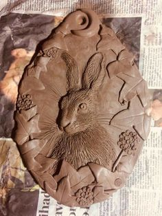 a close up of a clay carving of a rabbit