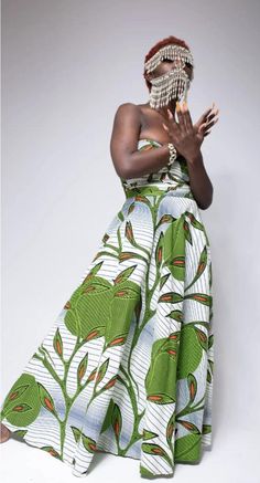 PRODUCT DETAILS: Designed in the U.S., hand-crafted in Africa Delivery within 2 weeks Print shown in Lime This long, strapless dress, designed with a sweetheart neckline, in an elegant African Ankara print, is a need for those extra special occasions when you want to dress up and feel elegant and beautiful! FABRIC CARE: Dry Clean. Hand Wash. Green One-shoulder Sundress, Green Strapless Sundress For Summer, Green Strapless Fitted Sundress, Green Strapless Dress With Fitted Bodice, Strapless Fitted Green Sundress, Green Bandeau Dress For Spring, Spring Green Strapless Dress With Fitted Bodice, Green Strapless Maxi Dress With Fitted Bodice, Green Bandeau Maxi Dress