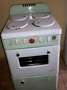 an old fashioned stove with two burners on it