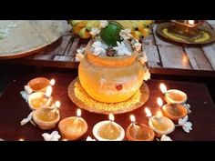 there is a cake with candles on the table