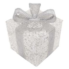 a white gift box with a silver bow on the front and side, all wrapped in shiny foil