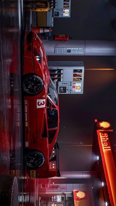 an overhead view of a red sports car