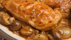 chicken with mushrooms and gravy on a plate