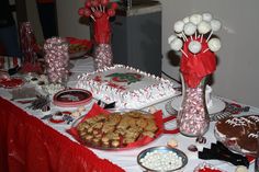 a table topped with lots of desserts and cakes