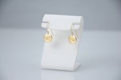 "14K solid gold earrings. 14K solid gold tiny disc earrings. Tiny gold disc earrings. Simple earrings. Dainty earrings. Gift for her. These earrings are simple and can be worn everyday. * 14K solid gold disc is 3/8\", 22 gauge. Please select yellow gold or white gold. * 14K solid gold ear wire The earrings will be shipped in a nice gift box. To see add-on click on the link below. https://www.etsy.com/shop/SashJewelry?section_id=12359884 To see more children's jewelry click on the link below. htt Gold 14k Round Disc Earrings, Gold Sterling Silver Round Disc Earrings, Simple 14k Gold-filled Round Earrings, Simple 14k Gold Filled Round Earrings, Simple 14k Gold Filled Earrings, Nickel-free Yellow Gold Round Disc Earrings, Simple Round 14k Gold Filled Earrings, Elegant Gold Round Disc Earrings, Tarnish Resistant Round Disc Earrings As Gift