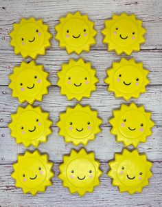 eight yellow sun shaped plates with smiley faces on the top and bottom, all in different shapes