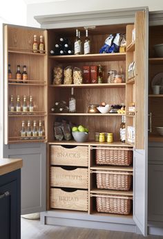 an open pantry filled with lots of food and drinks