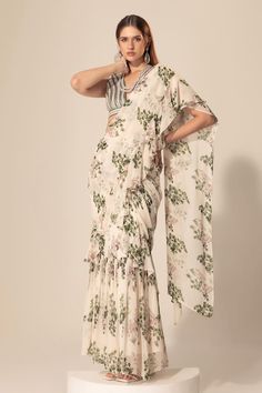 Ivory botanical printed ruffle pre-stitched saree with sequins, stones and beaded embroidered borders. Comes with a padded blouse. - Aza Fashions Elegant Fitted Floral Print Saree, Elegant Floral Print Pre-draped Saree For Reception, Elegant Floral Pre-draped Saree For Reception, Elegant Georgette Pre-draped Saree With Floral Print, Elegant Pre-draped Georgette Saree With Floral Print, Elegant Blouse Piece With Floral Print For Reception, Elegant Georgette Blouse With Floral Print, Elegant Floral Print Georgette Blouse, Wedding Georgette Pre-draped Saree With Floral Print