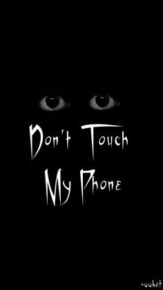 the words don't touch my phone written in white on a black background with two eyes