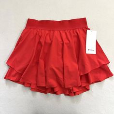 Nwt Lululemon Women Solid Carnation Red Court Rival High Rise Tennis Skirt Long 6. On The Court Or On The Trails, Keep Them On Their Toes In This Lined Lightweight Skirt. Swift Swift Fabric Is Lightweight, Four-Way Stretch, Sweat-Wicking, And Quick-Drying Features Designed For: Run Recycled Polyester: 100% Of The Polyester In This Product Is Recycled Built-In Liner : Lightweight Mesh Fabric Liner For Comfort And Support Lycra: Added Lycra Fibre For Shape Retention Storage: Dual Entry Pocket Fits Red Sports Skort For Summer, Sporty Red Tennis Skirt For Summer, Red Sporty Skort For Sports, Sporty Red Skort For Sports, Red Casual Skort For Sports, Casual Red Skort For Sports, Red Casual Sports Skort, Casual Red Sports Skort, Sporty Red Skirt For Spring