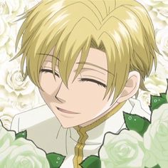 an anime character with blonde hair and green eyes wearing a white shirt surrounded by roses