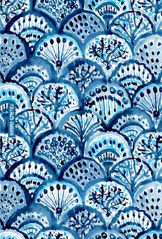 an artistic blue and white pattern with black dots on the bottom, in different sizes