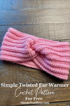 a pink knitted headband with the text, simple twisted ear warmer crochet pattern for free