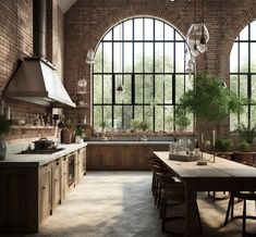 an industrial kitchen with large arched windows and brick walls