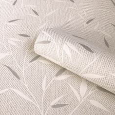 an image of a wallpaper with leaves and branches in white on grey background, close up