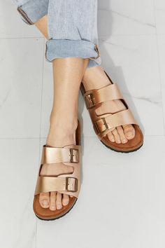 These double-banded slide sandals give a luxe look with their faux leather upper and cork sole. Their comfy design is perfect for wearing for almost any summer adventure. Gold Slides, Asian Market, High Quality Shoes, Summer Adventures, Gull, Size Pattern, Best Life, Trade Show, Slide Sandals