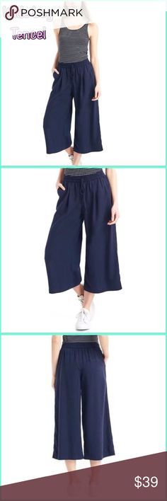 ❣️Gap Women's Navy Tencel Drapey Culottes pants Gap Dark Night Tencel Wide Leg Crop  Size Small, Brand new with out tags Sits at the upper waist. Relaxed through the hip and thigh. Wide leg opening hits at mid-calf. Inseam: regular 21" This product is made with TENCEL™ (Lyocell), a more sustainable fiber made from wood pulp sourced from responsibly managed forests. Shirring and drawcard ties at elasticized waist. Front slant pockets. Inner label is marked  ❣️ Top seller, 24hr shipping. Posh amba Casual Sleep Pants, Casual Sleepwear Trousers With Elastic Waistband, Casual Summer Sleepwear Trousers, Casual Sleep Pants With Pockets, Comfortable Summer Pants For Pajama Party, Gap Cotton Bottoms For Daywear, Casual Sleep Bottoms For Summer, Casual Wide Leg Sleepwear, Casual Sleepwear With Relaxed Fit Trousers