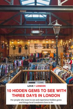 the inside of a clothing store with lots of clothes on display