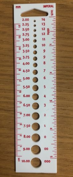 a ruler with different sizes and measurements on it