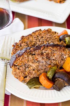 Flavorful and moist Roasted Vegetable Balsamic Meatloaf is a savory blend of ground beef and caramelized vegetables. Easily made gluten free, this is not your ordinary meatloaf! Serve it with fluffy mashed potatoes for a comfort food meal or turn it into a satisfying sandwich with homemade gluten free bread! | homemade meatloaf recipes | meatloaf dinner recipes | best meatloaf recipes | balsamic meatloaf recipes | meatloaf with vegetables | meatloaf with veggies | meatloaf recipes balsamic glaze