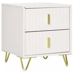 a white cabinet with two gold handles on the bottom and one door open to reveal an interesting design