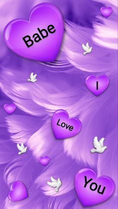 purple hearts with the words babe i love you written on them and white doves flying around