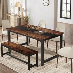 a dining room table with two benches and a clock on the wall