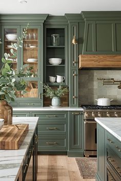 Green Kitchen Dreams Green Kitchen With Gold Hardware, Green Color Scheme Kitchen, Classic Green Kitchen, Green Cabinets With White Appliances, Green Paint Cabinets, Green Wall In Kitchen, Green Backsplash Brown Cabinets, Green Kitchen Cabinets Granite Countertops, Sage Green Kitchen Walls Dark Wood Cabinet Colors