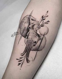 an elephant tattoo on the right arm with arrows and leaves around its trunk, in black and white