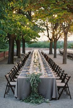 an instagram page with tables and chairs set up in the park for a formal dinner