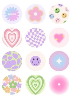 a bunch of different types of buttons on a white background with hearts, flowers and smiley faces