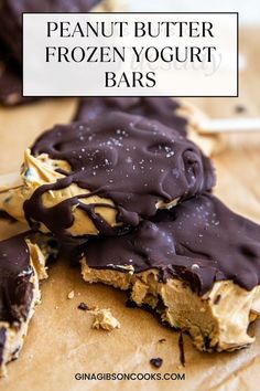 chocolate peanut butter frozen yogurt bars on a piece of parchment paper with text overlay