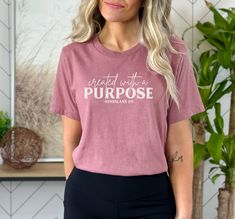 Looking for a soft, comfortable shirt that shows off your Christian faith? Look no further! This Created with a Purpose Bella Canvas shirt comes in many colors, and the unisex sizing means it's sure to fit just right. Whether you are looking for a shirt to wear to church or for a gift for a loved one, it's sure to be a favorite. And the message of faith is sure to inspire. So don't wait, order today! You'll be glad you did. Bella+Canvas Brand Shirt ~Adult Unisex Sizing, See chart in photos for p Ladies Bible Study, Created With A Purpose, Women Church, Quote Shirt, Bible Quote, Christian Women, Branded Shirts, Christian Faith, Shirts With Sayings