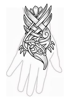 a tattoo design on the palm of someone's hand