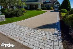 a house with a driveway in front of it