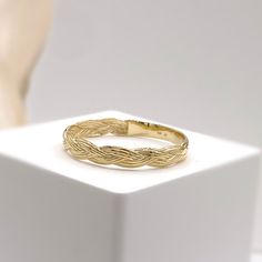 Elegant, daily wear, and stacking-friendly braided band ring made in 14K solid gold. Made to Order. Ships within 3-4 weeks. - Band width: 3.2mm - Finish: Yellow, Rose, or White - Made in 14 karat gold. - Stamp with 14K. Braided Ring Band, Fine Gold Jewelry, Braided Ring, Handmade Fine Jewelry, Gold Gift, White Ring, Yellow Gold Rings, Precious Metals, Jewelry Care