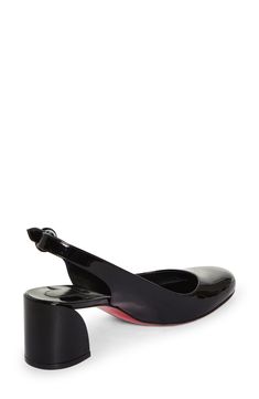 A rounded toe balances the bold, architectural heel of this patent-leather slingback pump grounded by that iconic Louboutin-red sole. 2 1/4" (55mm) heel Adjustable slingback strap with buckle closure Wipe with a soft, dry cloth and store in a dust bag Please note the red lacquer on soles will wear off as a result of normal use. To minimize the effect, avoid wearing in wet weather or on abrasive surfaces Leather upper, lining and sole Made in Italy Women's Designer Shoes Patent Leather Slingback Pumps With Sculpted Heel, Patent Leather Round Toe Slingback Pumps With Sculpted Heel, Chic Slingback Pumps With Red Sole And Round Toe, Sleek Slingback Heels With Glossy Finish, Slingback Patent Leather Heels With Glossy Finish, Luxury Patent Leather Slingback Pumps With Red Sole, Luxury Slingback Pumps With Red Sole In Patent Leather, Elegant Patent Leather Slingback Pumps With Red Sole, Formal Patent Leather Slingback Pumps With Red Sole