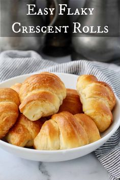 easy flaky crescent rolls in a white bowl on a marble countertop with text overlay