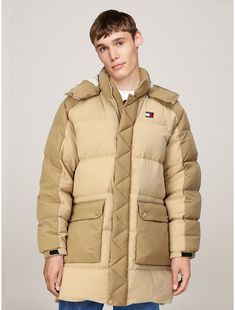 Tommy Hilfiger men's jacket. Take on the cold in style with our two-tone padded parka, complete with a bungee cord hood, front patch pockets and toasty insulation. Part of our Tommy Jeans collection.  Material: 100% Recycled Nylon ,  Polyamide. Hooded Beige Parka For Cold Weather, Beige Parka With Double-lined Hood For Cold Weather, Beige Parka With Adjustable Hood For Cold Weather, Beige Hooded Puffer Jacket With Double-lined Hood, Beige Hooded Puffer Jacket For Outdoor, Brown Hooded Puffer Jacket For Outdoor, Beige Parka With Detachable Hood For Outdoor, Beige Puffer Jacket With Detachable Hood For Outdoor, Beige Parka With Detachable Hood For Streetwear