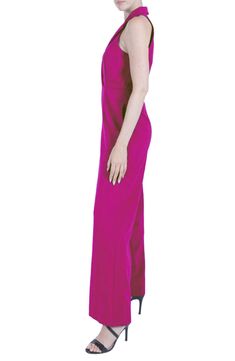 This full-of-polish jumpsuit is designed in a sleeveless silhouette with notched lapels and wide legs. 62" length; 32" inseam; 28" leg opening (size 8) Back zip closure Notched lapels Sleeveless Side-seam pockets Lined 88% polyester, 12% spandex Machine wash, line dry Imported Formal Solid Color Strapless Sleeveless Jumpsuit, Elegant Sleeveless Purple Jumpsuits And Rompers, Elegant Pink Strapless Jumpsuit For Evening, Elegant Pink Evening Strapless Jumpsuit, Sleeveless Pink Pantsuit For Spring, Chic Sleeveless Pink Pantsuit, Sleeveless Pink Pantsuit For Work, Pink Sleeveless Pantsuit For Work, Wide Legs