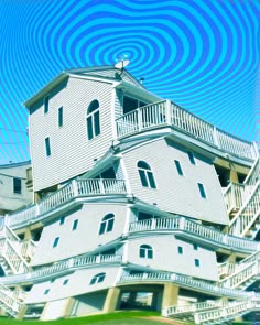 an artistic image of a house with spirals in the sky and stairs leading up to it