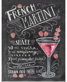 a chalkboard sign with the words french martini written on it and a glass filled with raspberries