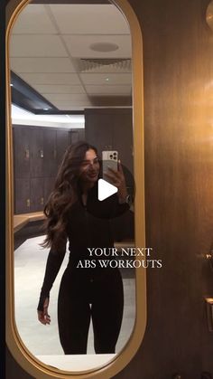 a woman taking a selfie in front of a mirror with the caption your next abs workouts