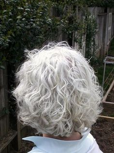 My hair stylist says I'm on 20% grey but this will give me an idea of down the road. White Hair Curly Short, Silver Short Curly Hair, Short White Curly Hair, Messy Short Curly Hair, Platinum Curly Hair Natural Curls, Silver Hair Curly, White Curly Hairstyles, Curly Platinum Hair, Short Grey Curly Hair