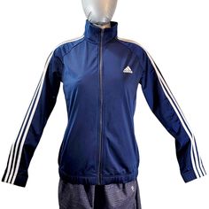 Adidas Track Jacket Women's Size Large L Full Zip Blue And White 3 Stripes Logo. This Adidas Track Jacket Women's Size Large L Full Zip Blue And White 3 Stripes Logo Is Brand New With Tags, The Color Of The Item May Be Off Due To Lighting. Please See Photos For The Best Representation Of The Items Condition. All Measurements Are Done While Lying Flat, Chest 21" (Is Measured Arm Pit To Pit), Length 27" (Is Top Of Shoulder To Bottom Of Hem) & Waist 18.5" But Is Elastic (Is From Side To Side). Than Blue Three Stripes Track Jacket For Fall, Navy Adidas Track Jacket For Sports, Adidas Navy Track Jacket For Sports, Casual Navy Track Jacket, Navy Adidas Long Sleeve Track Jacket, Adidas Navy Long Sleeve Track Jacket, Sporty Navy Adidas Outerwear, Adidas Navy Sports Outerwear, Navy Adidas Sports Outerwear